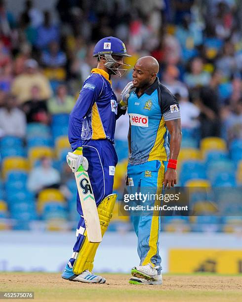 Shoaib Malik of Barbados Tridents and Tino Best of St. Lucia Zouks confrontate during a match between Barbados Tridents and St. Lucia Zouks as part...