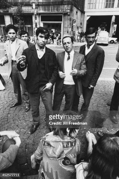 Group of men in Dam Square, Amsterdam, circa 1982.