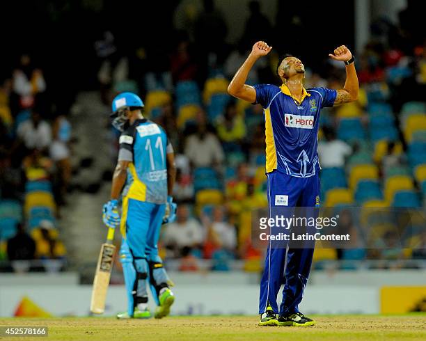 Rayad Emrit of Barbados Tridents celebrates winning after bowling the last of a match between Barbados Tridents and St. Lucia Zouks as part of the...