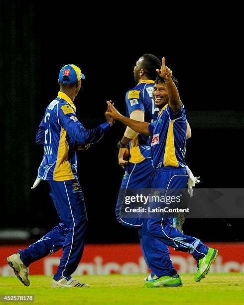 Jeevan Mendis of Barbados Tridents celebrates the dismissal of Darren Sammy of St. Lucia Zouks during a match between Barbados Tridents and St. Lucia...