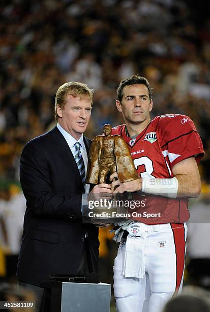 Commissioner Roger Goodell presents the Walter Payton Man Of The Year Award to quarterback Kurt Warner of the Arizona Cardinas prior to playing the...