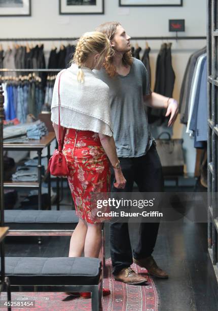 Melanie Griffith and Alexander Bauer are seen on July 23, 2014 in Los Angeles, California.