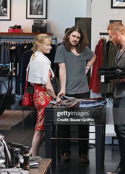 Melanie Griffith and Alexander Bauer are seen on July 23, 2014 in Los Angeles, California.