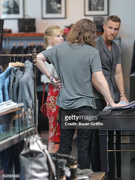 Melanie Griffith and Alexander Bauer are seen on July 23, 2014 in Los Angeles, California.