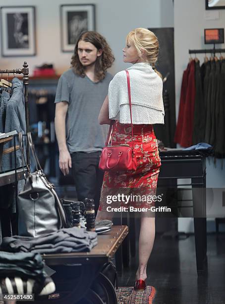 Melanie Griffith and Alexander Bauer are seen on July 23, 2014 in Los Angeles, California.