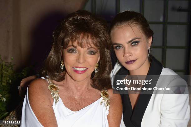Joan Collins and Cara Delevingne attend the Leonardo Dicaprio Gala at Domaine Bertaud Belieu on July 23, 2014 in Saint-Tropez, France.