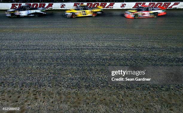 General view of racing during the Camping World Truck 2nd Annual 1-800 Car Cash Mudsummer Classic at Eldora Speedway on July 23, 2014 in Rossburg,...