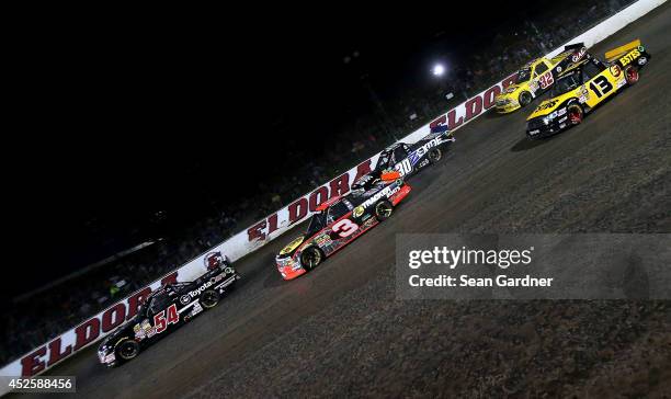 Darrell Wallace Jr. , driver of the ToyotaCare Toyota, leads a group of cars during the Camping World Truck 2nd Annual 1-800 Car Cash Mudsummer...