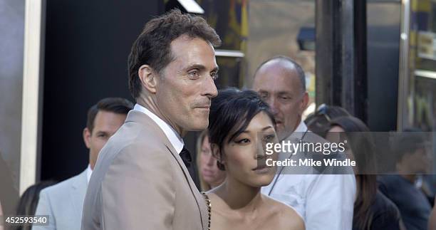 Actor Rufus Sewell and guest attend the Los Angeles premiere of Hercules at TCL Chinese Theatre on July 23, 2014 in Hollywood, California.