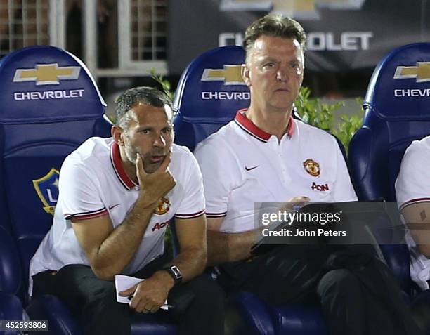 Assistant Manager Ryan Giggs and Manager Louis van Gaal of Manchester United watch frrom the bench during the pre-season friendly match between LA...