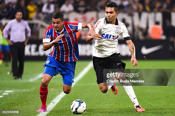 Petros of Corinthians struggles for the ball with a Diego Macedo of Bahia during a match between Corinthians and Bahia as part of Copa do Brasil 2014...