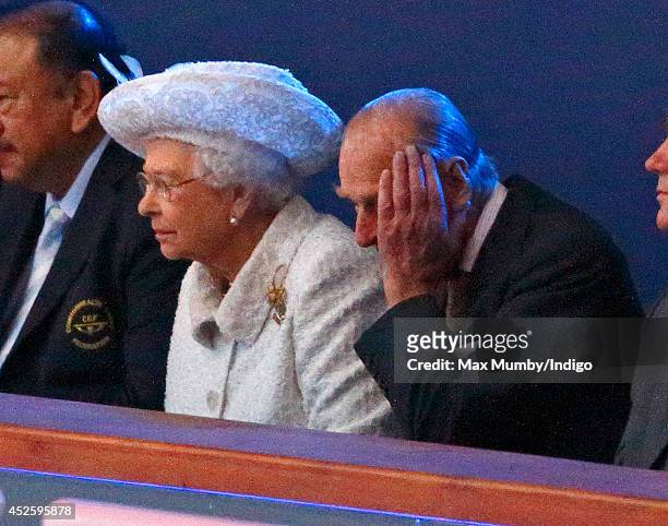 Queen Elizabeth II and Prince Philip, Duke of Edinburgh attend the Opening Ceremony for the Glasgow 2014 Commonwealth Games at Celtic Park on July...