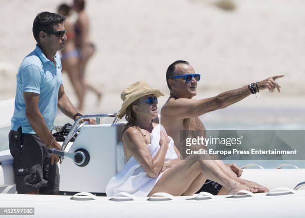 Baroness Carmen Thyssen-Bornemisza and Manolo Segura are seen on July 23, 2014 in Ibiza, Spain.