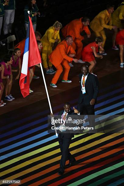 Flag bearer and Athlete Daniel Bailey of Antigua and Barbuda during the Opening Ceremony for the Glasgow 2014 Commonwealth Games at Celtic Park on...