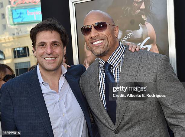 President of Metro-Goldwyn-Mayer Pictures Film Division Jonathan Glickman and actor Dwayne Johnson arrive to the premiere of Paramount Pictures'...