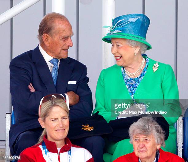 Prince Philip, Duke of Edinburgh and Queen Elizabeth II watch the England vs Wales women's hockey match at the Glasgow National Hockey Centre on day...