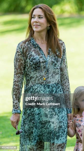 Crown Princess Mary of Denmark attends the annual Summer photo call for the Royal Danish family at Grasten Castle on July 24, 2014 in Grasten,...