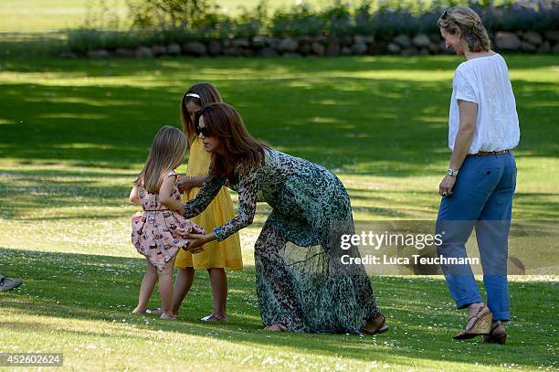 Crown Princess Mary of Denmark and Princess Josephine of Denmark attend the annual summer photo call for the Royal Danish family at Grasten Castle on...