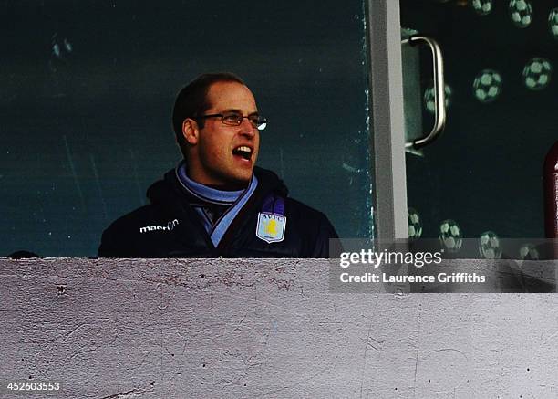 Prince William, Duke of Cambridge watches the Barclays Premier League match between Aston Villa and Sunderland at Villa Park on November 30, 2013 in...