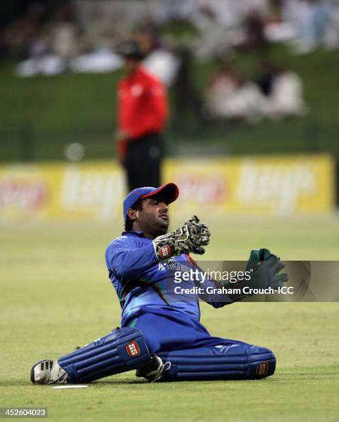 Mohammad Shahzad of Afghanistan takes a catch during the Ireland v Afghanistan Final at the ICC World Twenty20 Qualifiers at the Zayed Cricket...