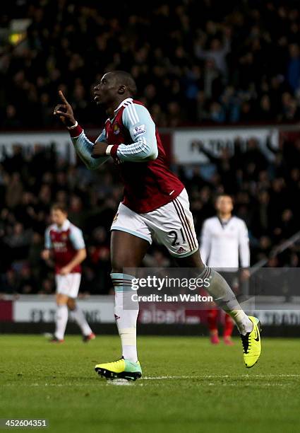 Mohamed Diame of West Ham United celebrates the first goal during the Barclays Premier League match between West Ham United and Fulham at Boleyn...