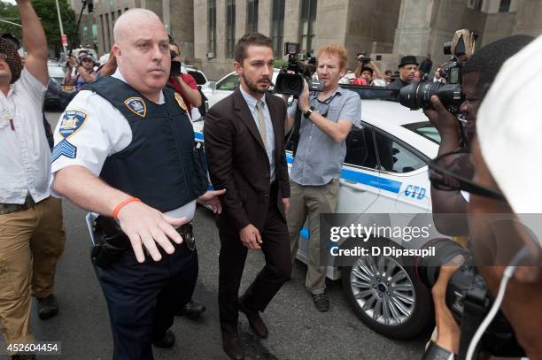 Shia LaBeouf is seen leaving Manhattan Criminal Court on July 24, 2014 in New York City. LaBeouf was charged with criminal trespass, disorderly...