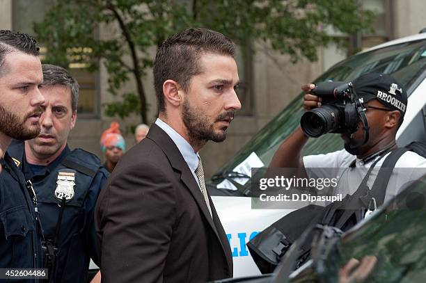 Shia LaBeouf is seen leaving Manhattan Criminal Court on July 24, 2014 in New York City. LaBeouf was charged with criminal trespass, disorderly...