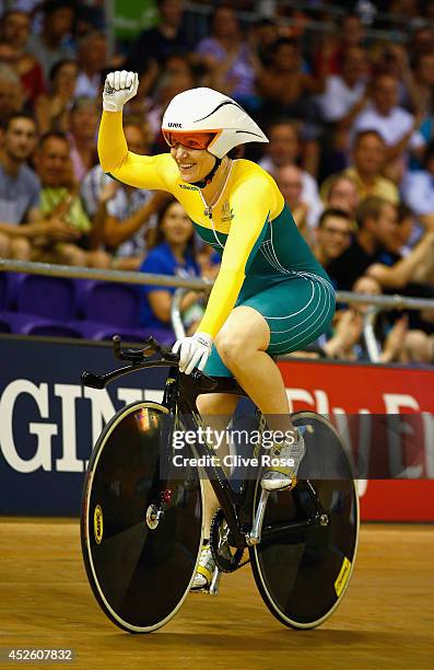 Anna Meares of Australia celebrates winning gold in the Women's 500m Time Trial at Sir Chris Hoy Velodrome during day one of the Glasgow 2014...