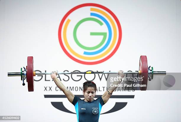 Sanjita Chanu Khumukcham of India competes in the Snatch on her way to winning the Gold Medal in the Women's 48kg Weightlifting at the Scottish...