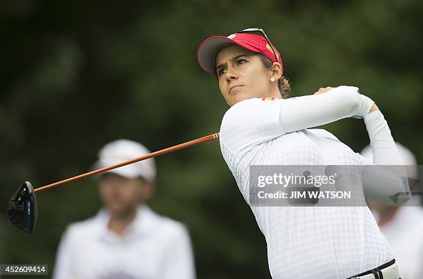 Spanish golfer Azahara Munoz tees off during the first round of the LGPA International Crown at Caves Valley Golf Club in Owings Mills, Maryland,...