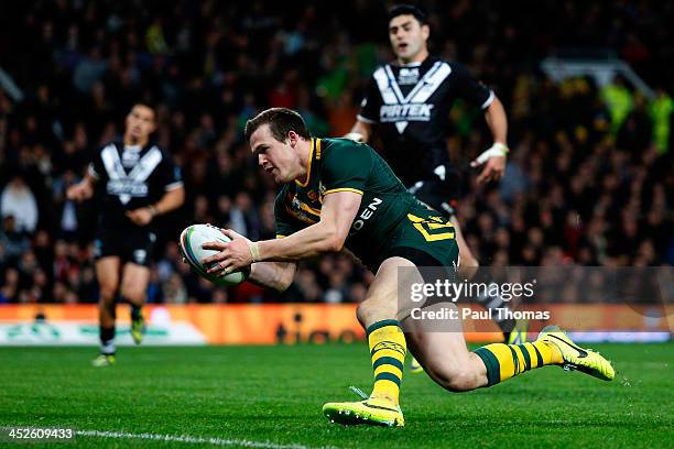 Brett Morris of Australia scores a try during the Rugby League World Cup final between New Zealand and Australia at Old Trafford on November 30, 2013...