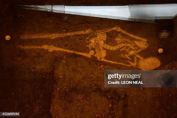 The site where the bones of Britain's King Richard III were found is shown in the new visitor's centre on the site where his remains were discovered,...