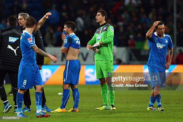 Eugen Polanski, Kai Herdling, Koen Casteels and Sejad Salihovic of Hoffenheim react after the Bundesliga match between 1899 Hoffenheim and Werder...