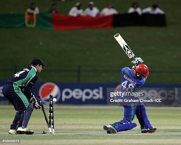 Nawroz Mangal of Afghanistan is bowled by George Dockrell of Ireland during the ICC World Twenty20 Qualifier Final between Ireland and Afghanistan at...