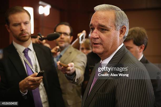 Committee Chairman of the House Veterans' Affairs Committee Rep. Jeff Miller speaks to members of the media after a conference committee meeting of...