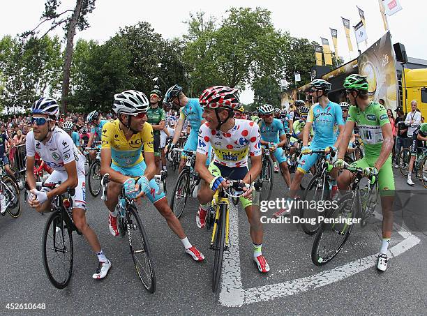 The jesey holders Thibaut Pinot of France and FDJ.fr in the best young rider's white jersey, Vincenzo Nibali of Italy and the Astana Pro Team in the...