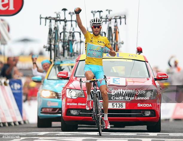 Vincenzo Nibali of Italy and Astana Pro Cycling celebrates winning the eighteenth stage of the 2014 Tour de France, a 146km stage between Pau and...