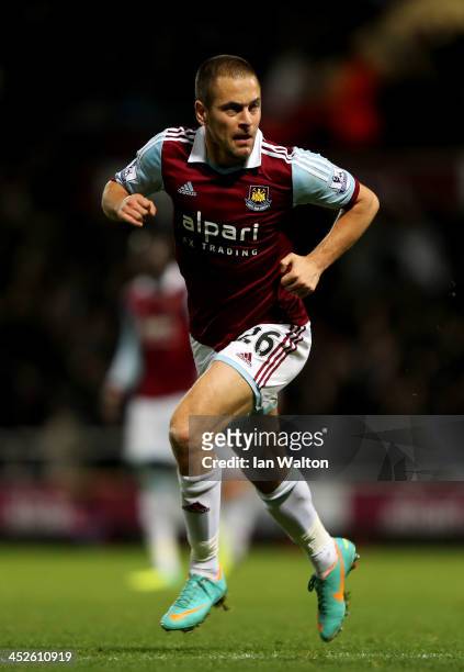 Joe Cole of West Ham United celebrates as he scores their third goal during the Barclays Premier League match between West Ham United and Fulham at...
