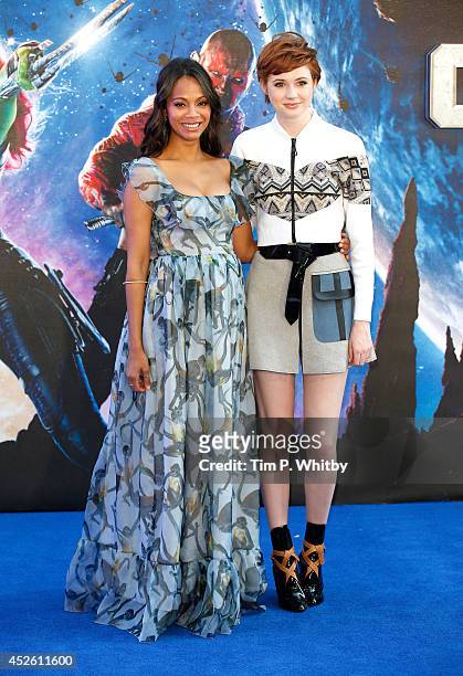 Zoe Saldana and Karen Gillan attend the UK Premiere of "Guardians of the Galaxy" at Empire Leicester Square on July 24, 2014 in London, England.