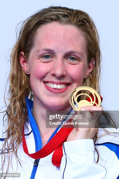 Gold medallist Hannah Miley of Scotland celebrates during the medal ceremony for the Women's 400m Individual Medley Final at Tollcross International...