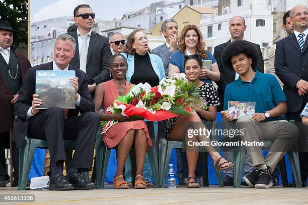 New York City Mayor Bill de Blasio, Chirlane McCray, Chiara de Blasio and Dante de Blasio receive gifts during a visit to Mayor de Blasio's...