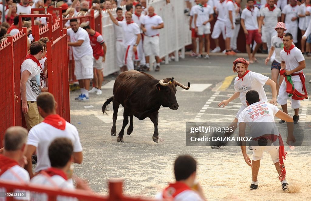 Basque Masculinity Young men dressed in Basque traditional clothing participate in the ...