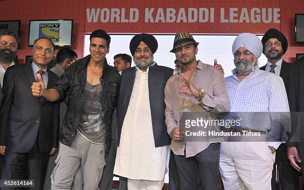 Deputy Chief Minister of Punjab and WKL president Sukhbir Badal with team Speedy Singhs co-owner Akshay Kumar and team Yo Yo Tigers co-owner Yo Yo...