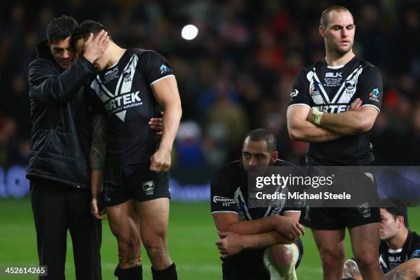 Stephen Kearney the head coach of New Zealand puts an arm around Sonny Bill Williams after his sides 2-34 defeat during the Rugby League World Cup...