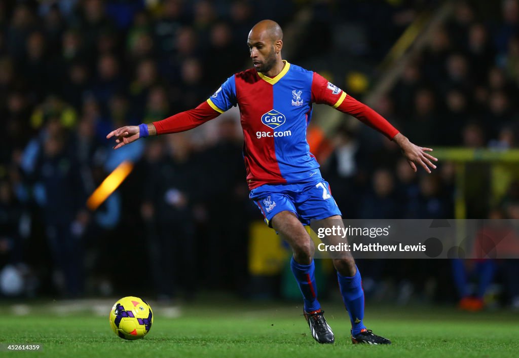 Malian winger Jimmy Kébé in old Crystal Palace kit with gac.com as the sponsor