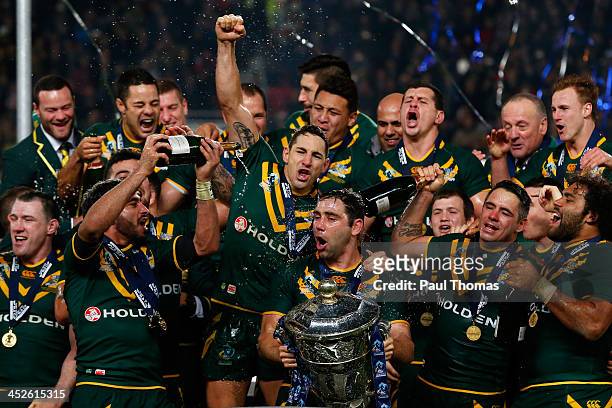 Captain Cameron Smith of Australia celebrates with team mates and the trophy after the Rugby League World Cup final between New Zealand and Australia...