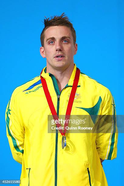 Silver medallist Matthew Cowdrey of Australia poses during the medal ceremony for the Men's 100m Freestyle S9 Final at Tollcross International...