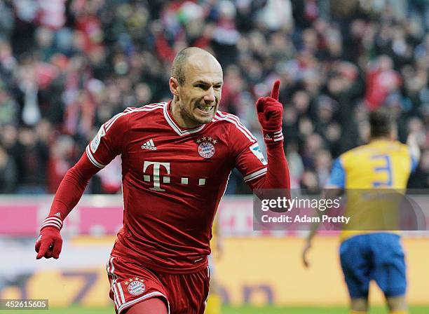 Arjen Robben of Bayern celebrates after heading in a goal during the Bundesliga match between Bayern Muenchen and Eintracht Braunschweig at Allianz...
