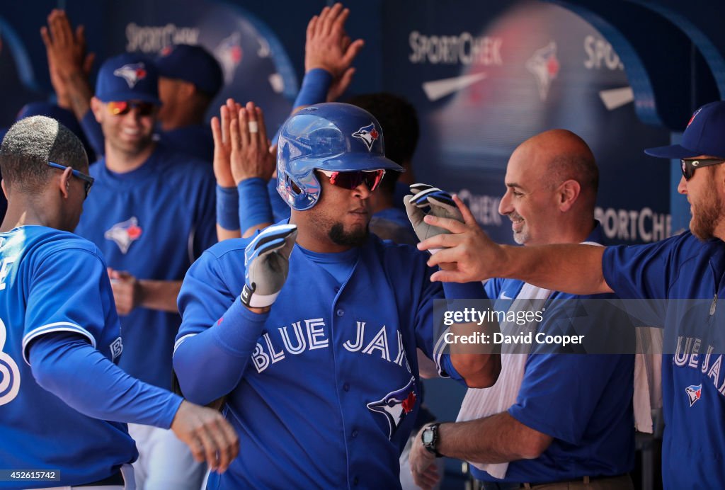 Juan Francisco (47) of the Toronto Blue Jays gets props fro his team mates after he hit a two run homer in the bottom of the third to make it 5-0