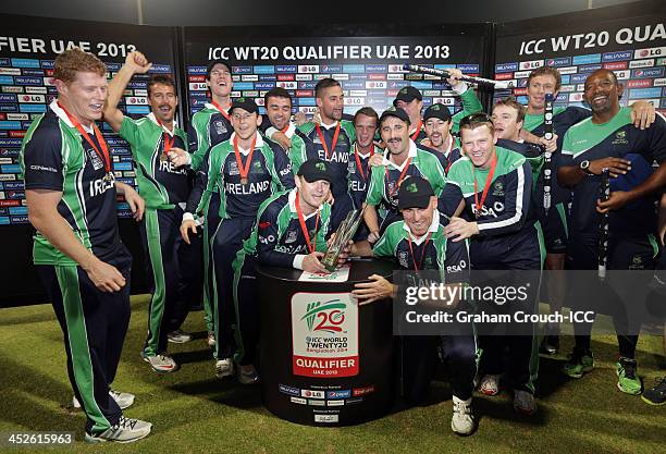 The Irish team celebrate on the stage after their victory over Afghanistan in the Ireland v Afghanistan Final at the ICC World Twenty20 Qualifiers at...